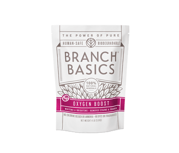 A pouch of Branch Basics Oxygen Boost, designed for laundry, stain and grout cleaning.